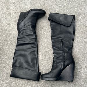 Black leather fold over tall wedge boot with platform